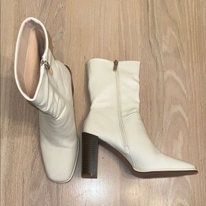 Heeled white faux leather boots